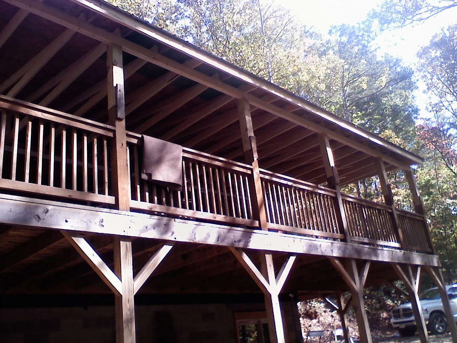 Timber framing under a new elevated porch and deck — Roof Leak Repair in Saint Clairsville by Roofing Brothers